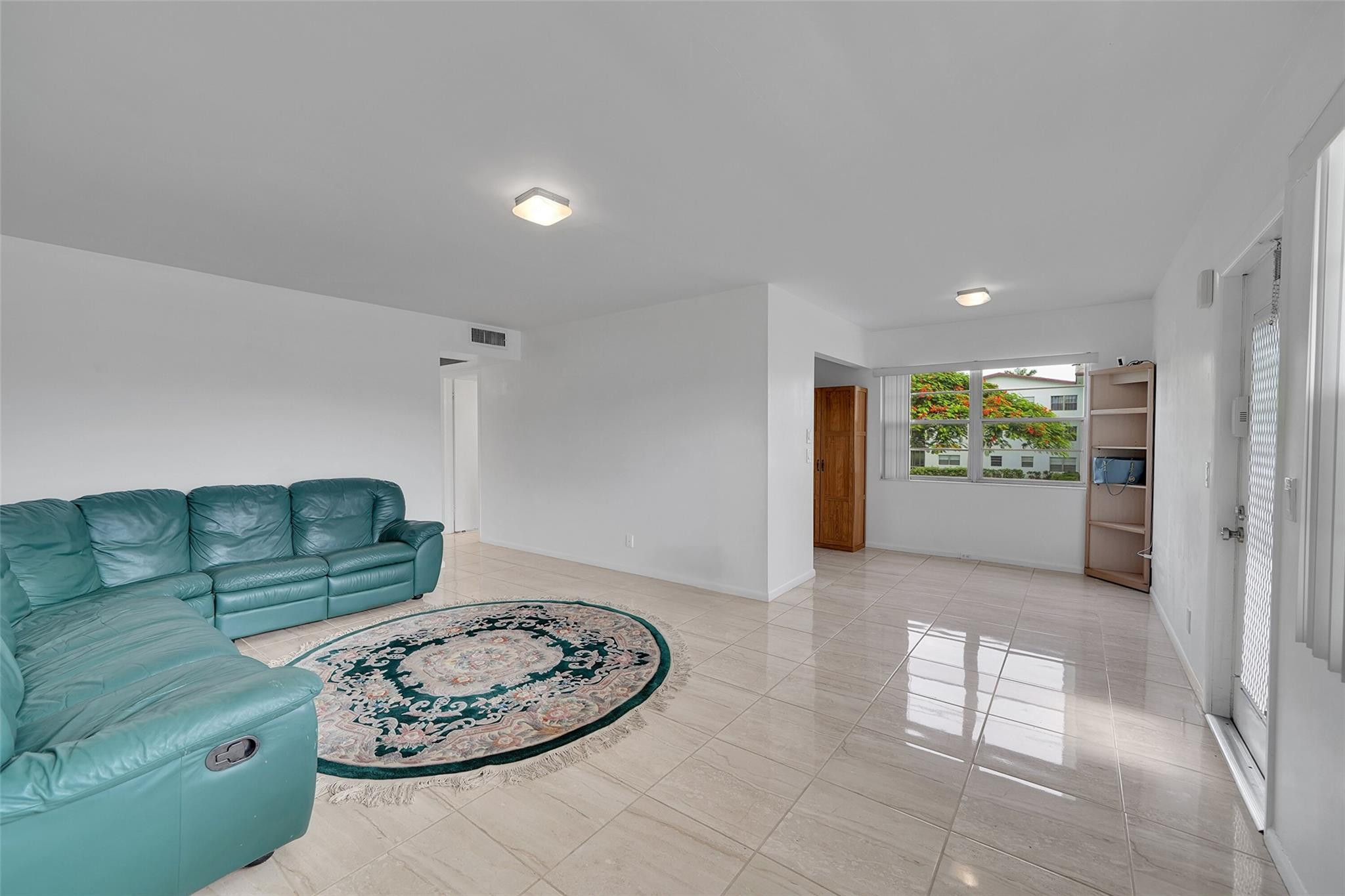486 Fanshaw L, Unit 486 Boca Raton, FL 33434 - Photo 13 of 44 Sparkling Living / Dining Room