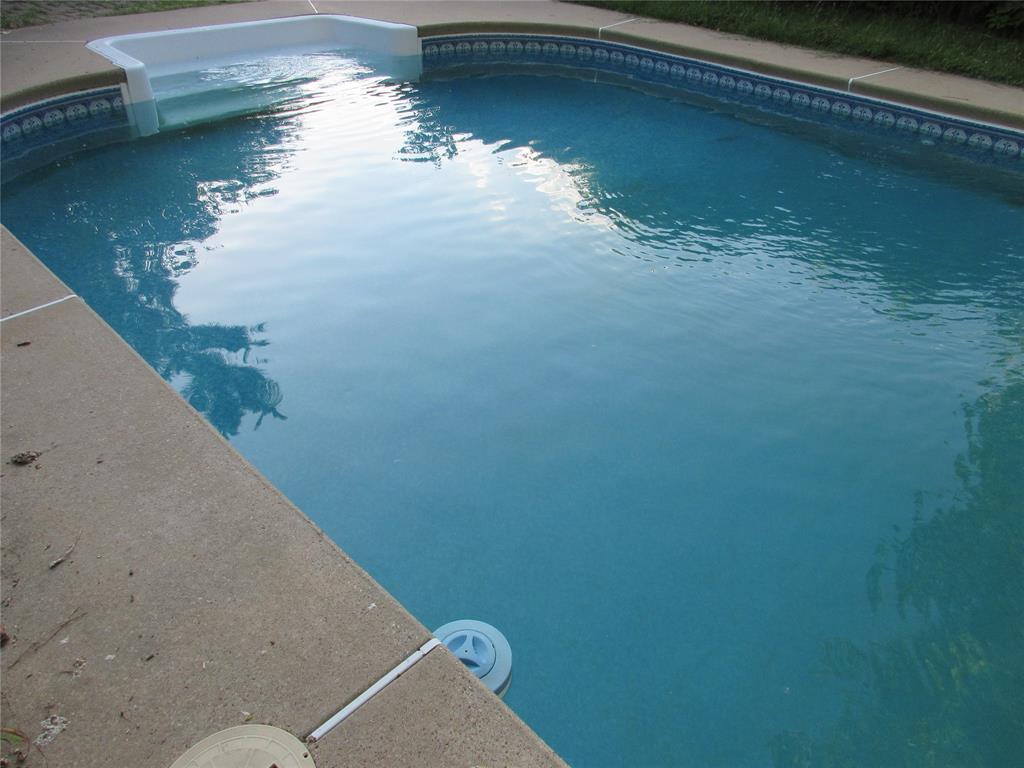 a view of a lake from a balcony