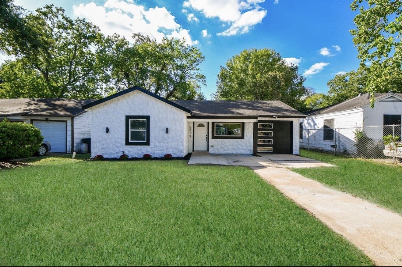 6834 St Augustine Street Houston, TX 77021 - Photo 1 of 21 a front view of house with a garden