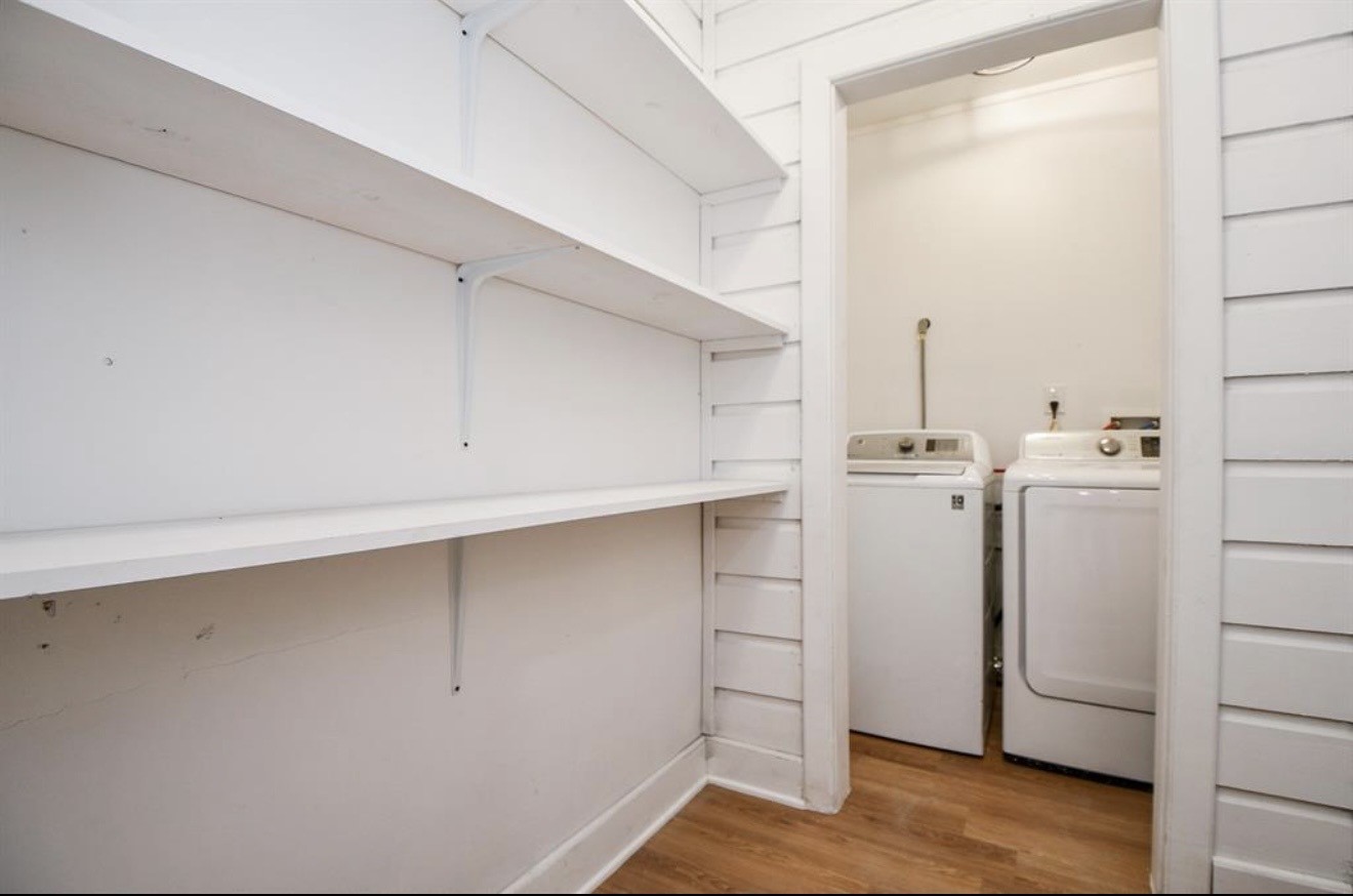 6834 St Augustine Street Houston, TX 77021 - Photo 17 of 21 a view of walk in closet with empty racks