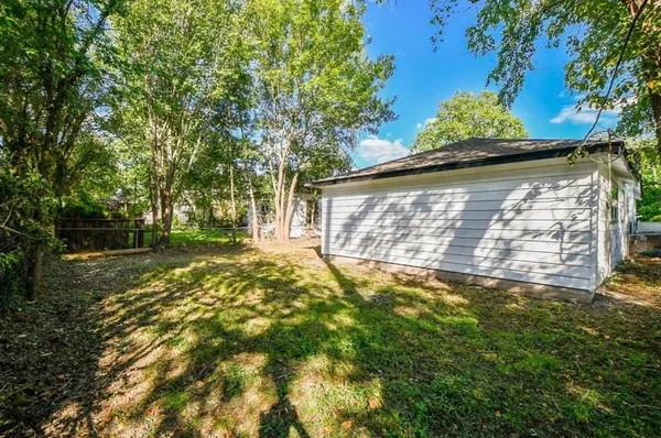 a view of yard with tree and green space