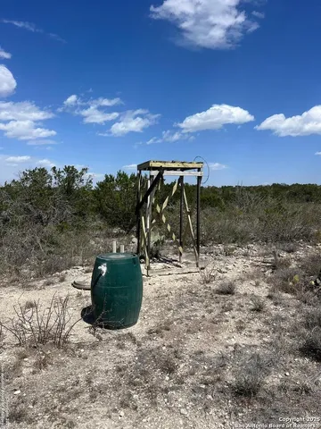 a view of a yard with an outdoor space