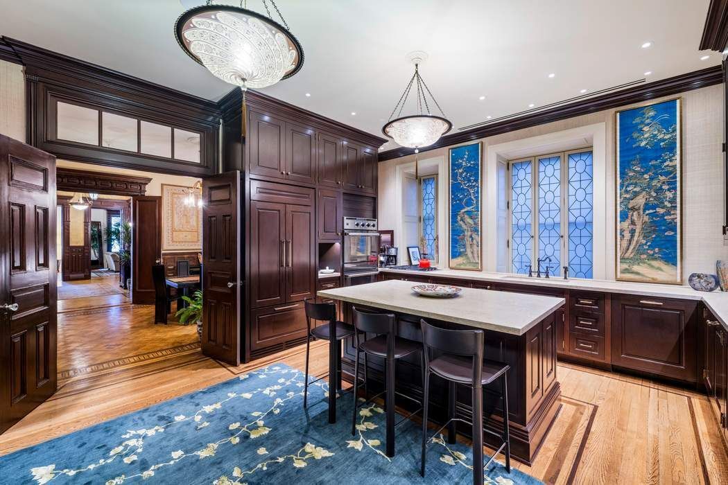 205 West 57th Street, Unit 9BBA Manhattan, NY 10019 - Photo 6 of 14 a view of a dining room with furniture window and wooden floor