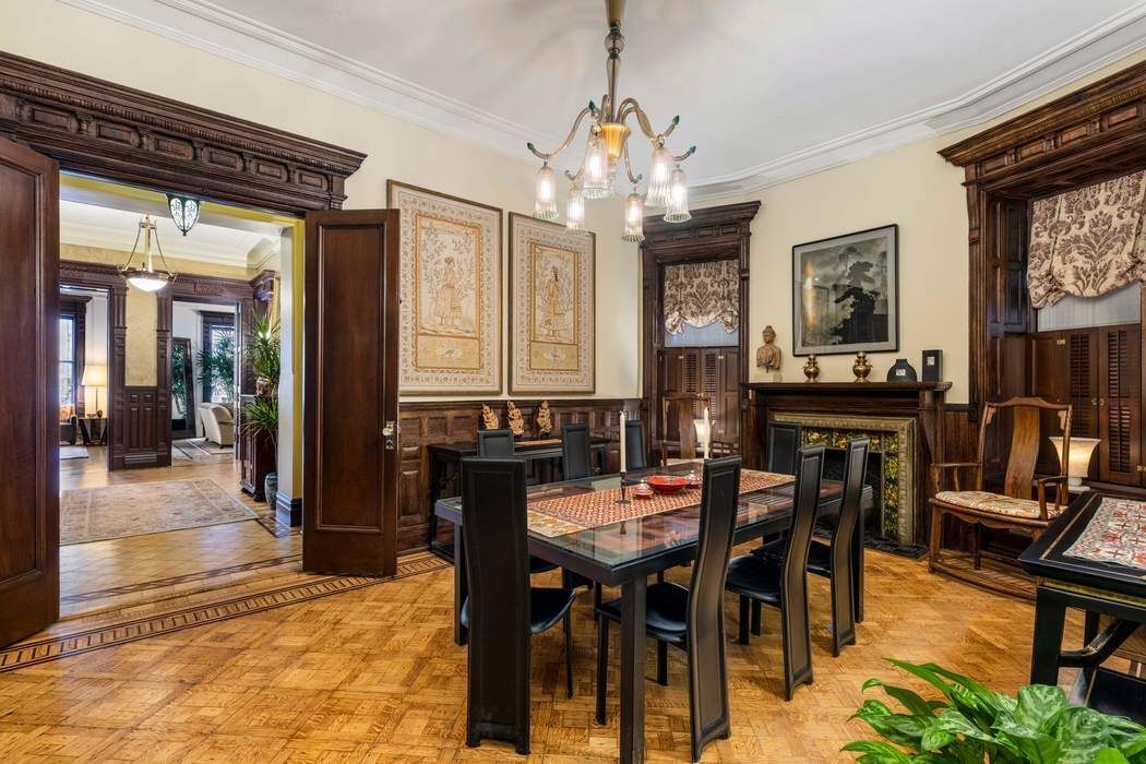 205 West 57th Street, Unit 9BBA Manhattan, NY 10019 - Photo 8 of 14 a view of a dining room with furniture
