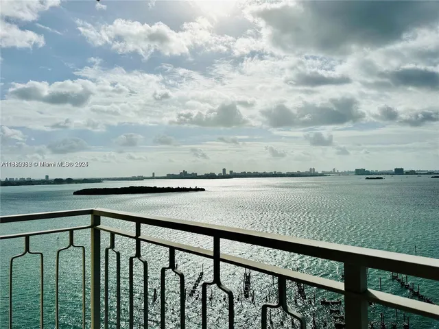 an aerial view of a house with outdoor space