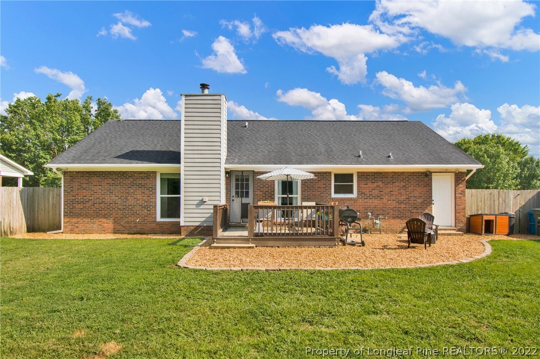 1021 Locks Creek Road Fayetteville, NC 28312 - Photo 28 of 34 a front view of house with yard and seating space