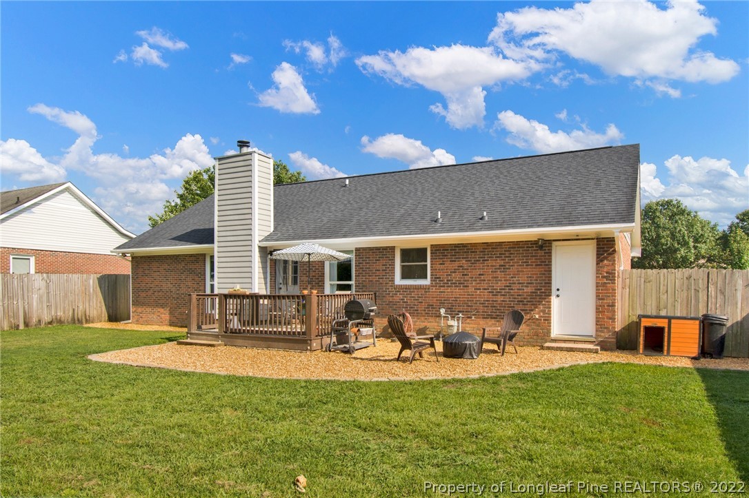 1021 Locks Creek Road Fayetteville, NC 28312 - Photo 29 of 34 a front view of house with yard patio and fire pit