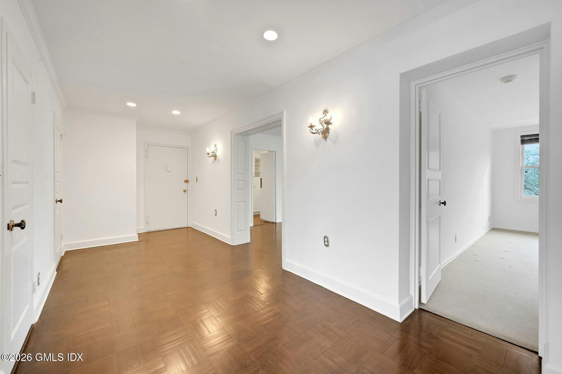 630 Steamboat Road, Unit 4AN Greenwich, CT 06830 - Photo 6 of 32 an empty room with closet and a bathroom