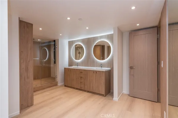 a view of entryway with wooden floor