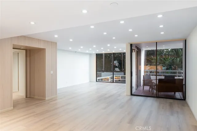 a view of a an entryway with wooden floor