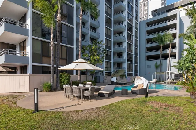 a view of a swimming pool with a patio