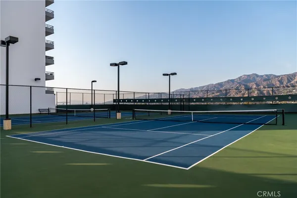a view of swimming pool with seating area
