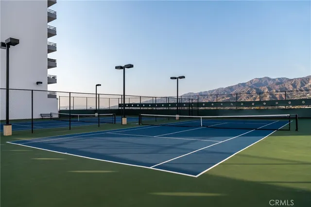 a view of swimming pool with seating area
