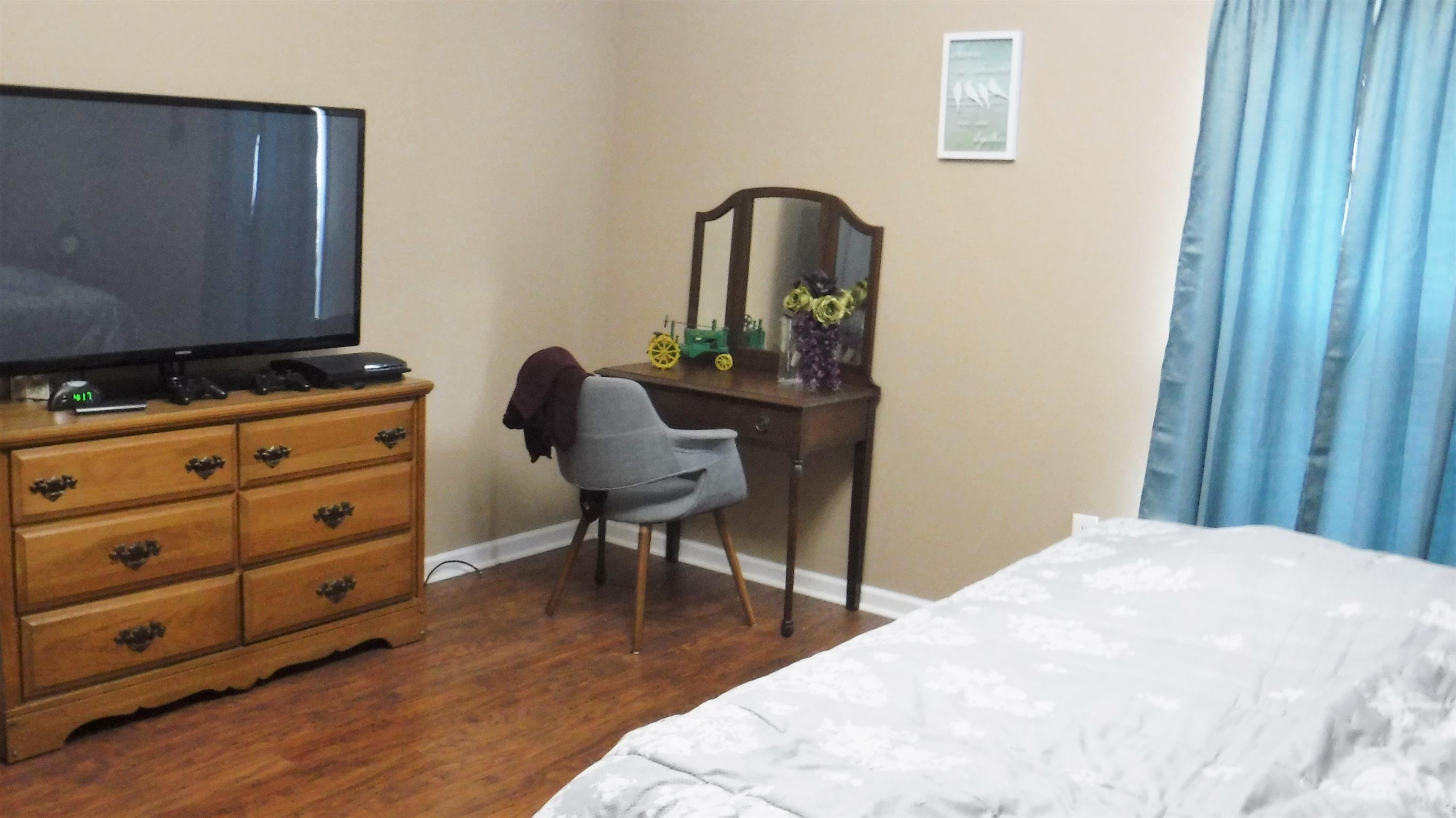 8 Merideth Lynn Road Fayetteville, TN 37334 - Photo 14 of 19 a bedroom with furniture and a window