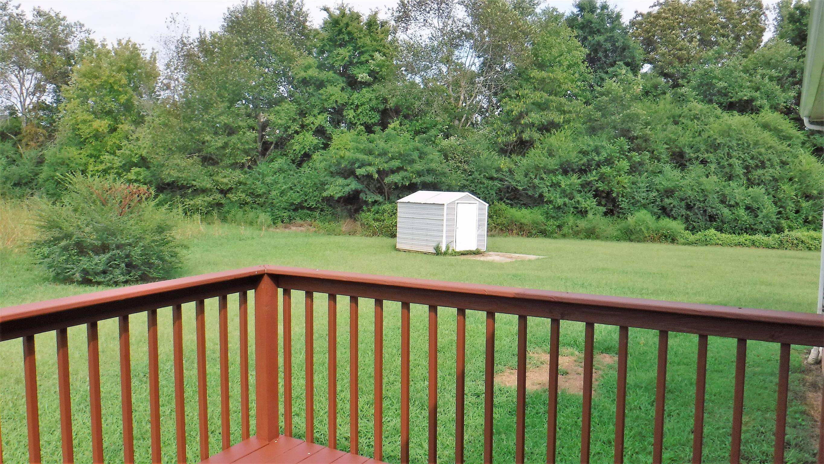 8 Merideth Lynn Road Fayetteville, TN 37334 - Photo 18 of 19 a balcony with trees in the background