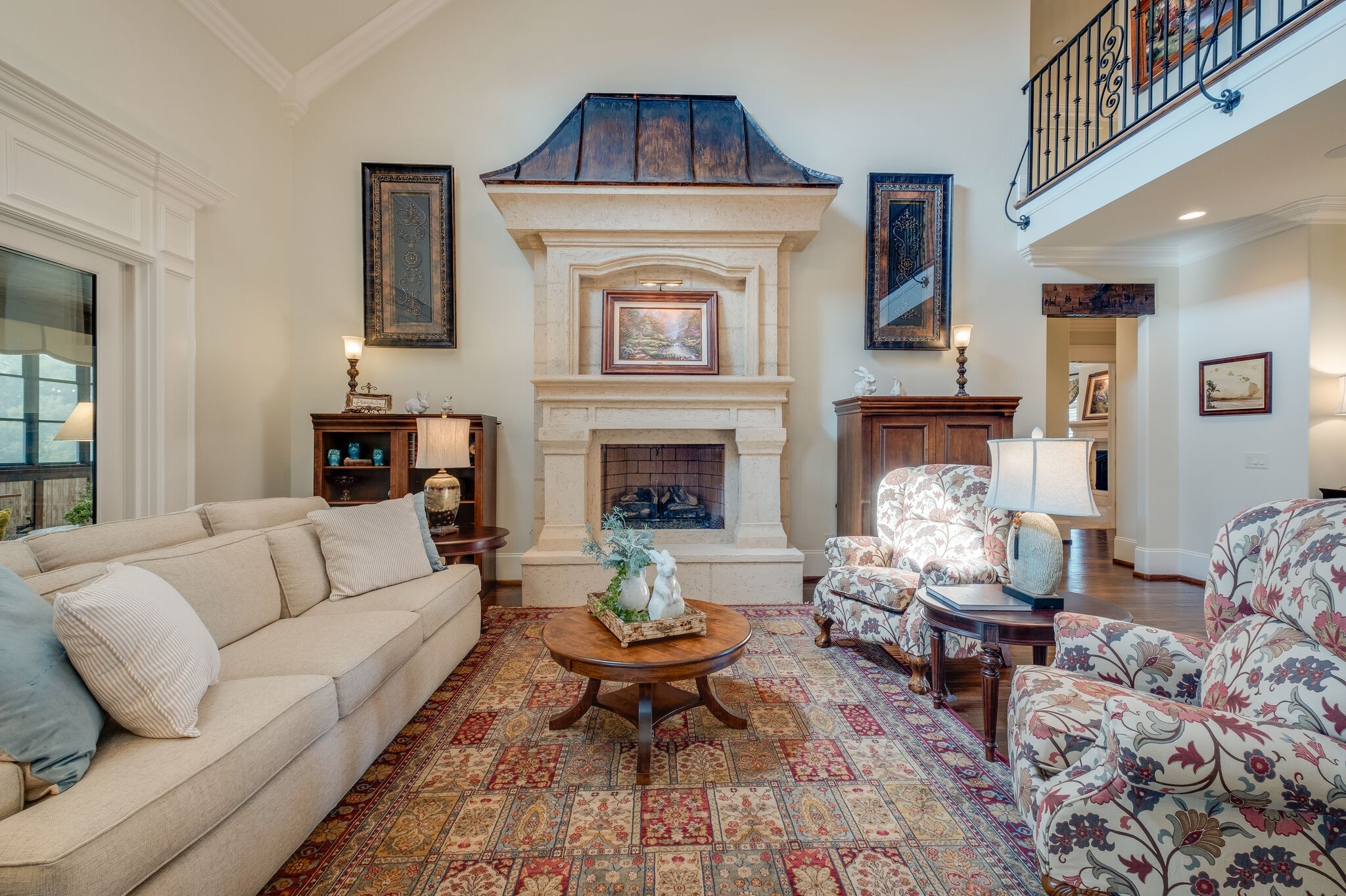 4411 Peytona Lane Franklin, TN 37064 - Photo 11 of 50 a living room with furniture a rug and a fireplace