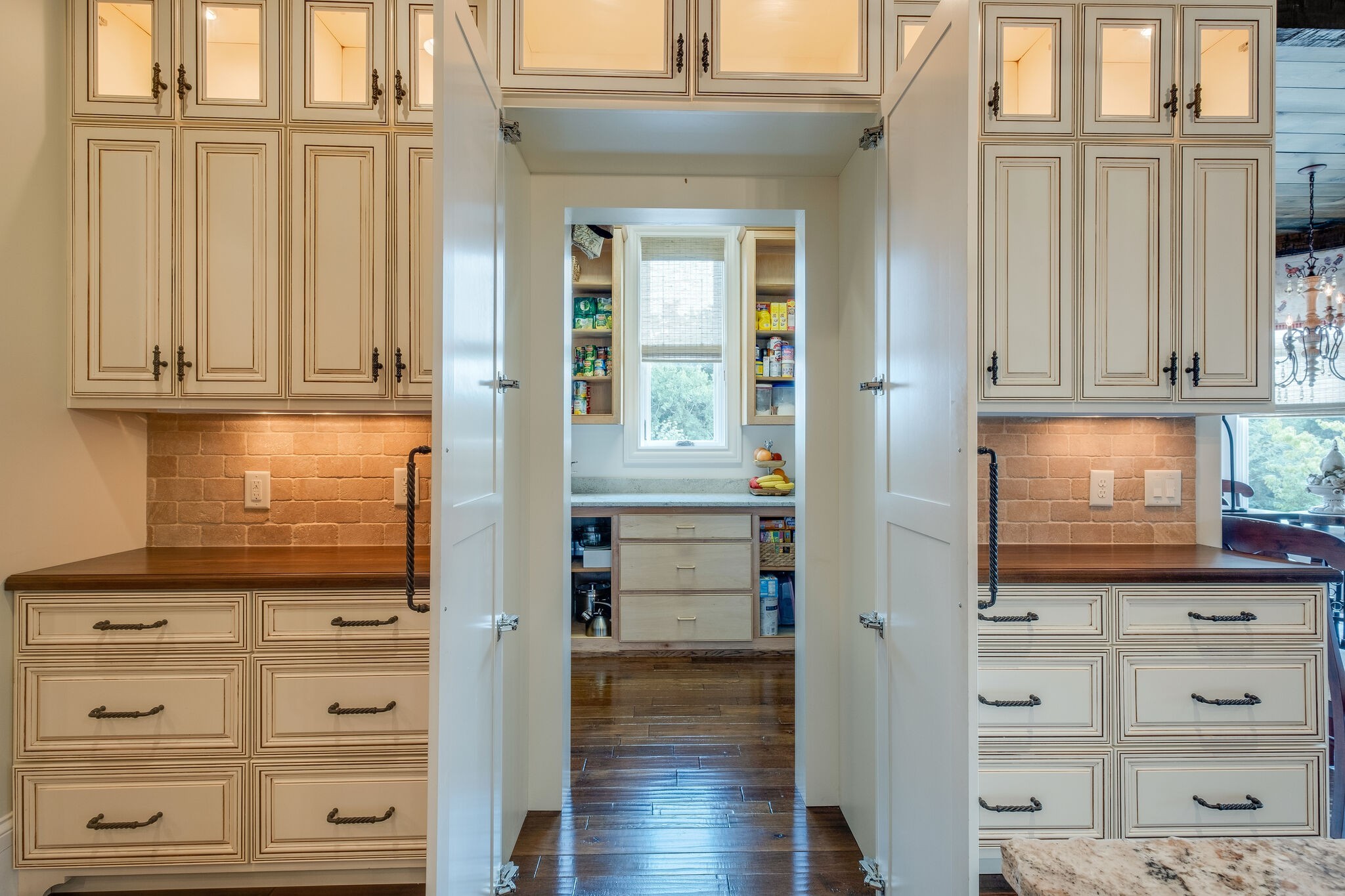 4411 Peytona Lane Franklin, TN 37064 - Photo 15 of 50 a view of kitchen with wooden floor and cabinets