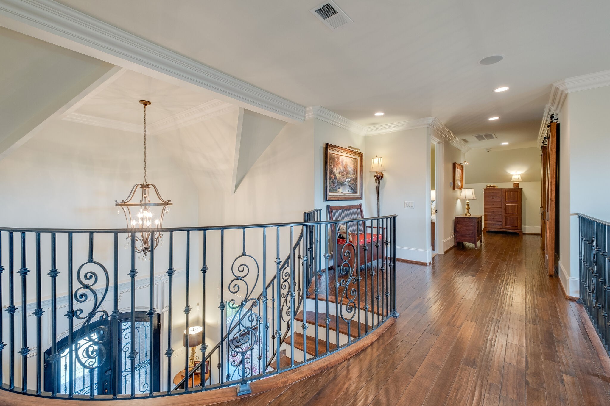 4411 Peytona Lane Franklin, TN 37064 - Photo 29 of 50 a view of a hallway with wooden floor and stairs