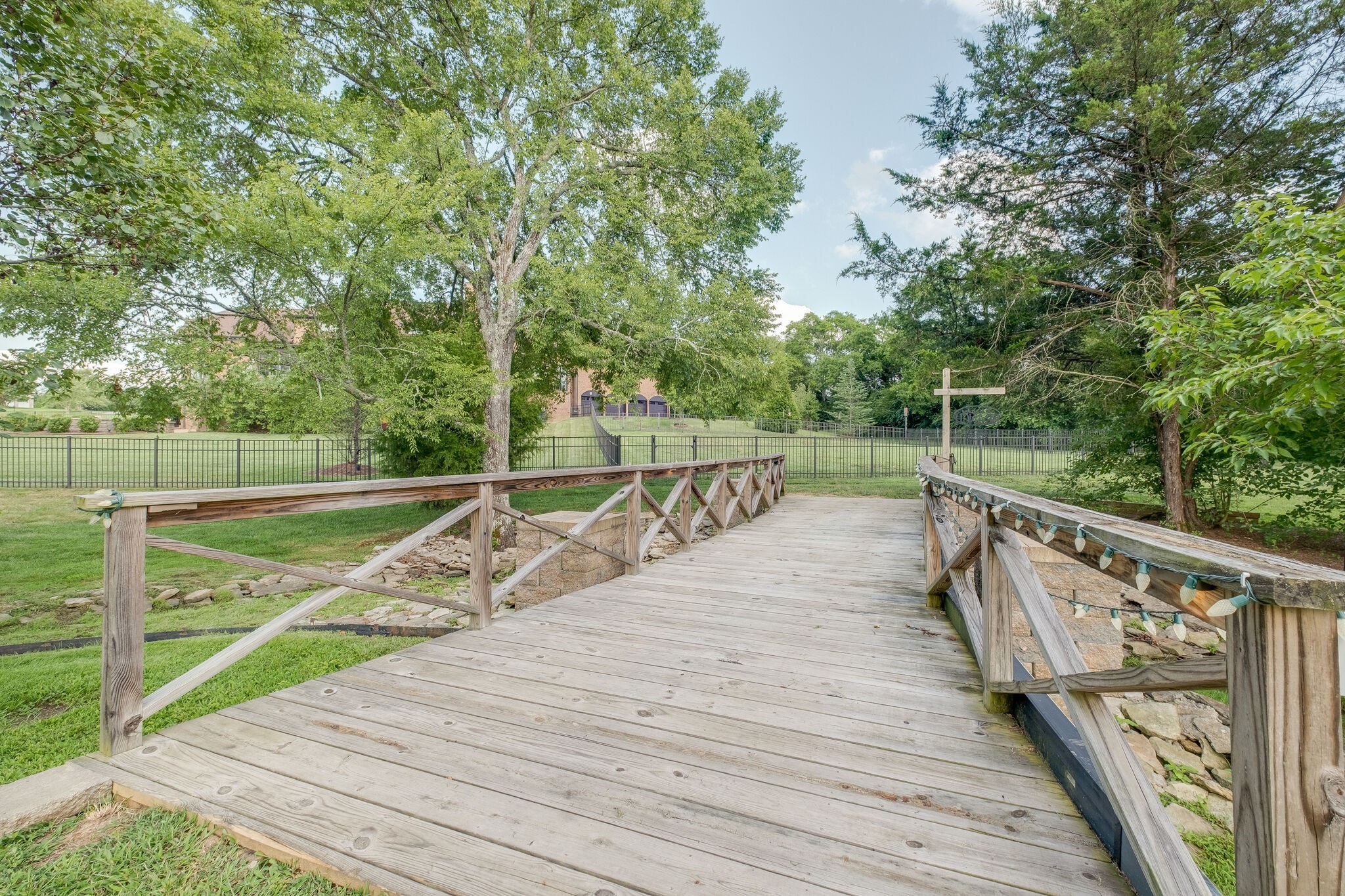 4411 Peytona Lane Franklin, TN 37064 - Photo 43 of 50 a view of a balcony with wooden floor and fence