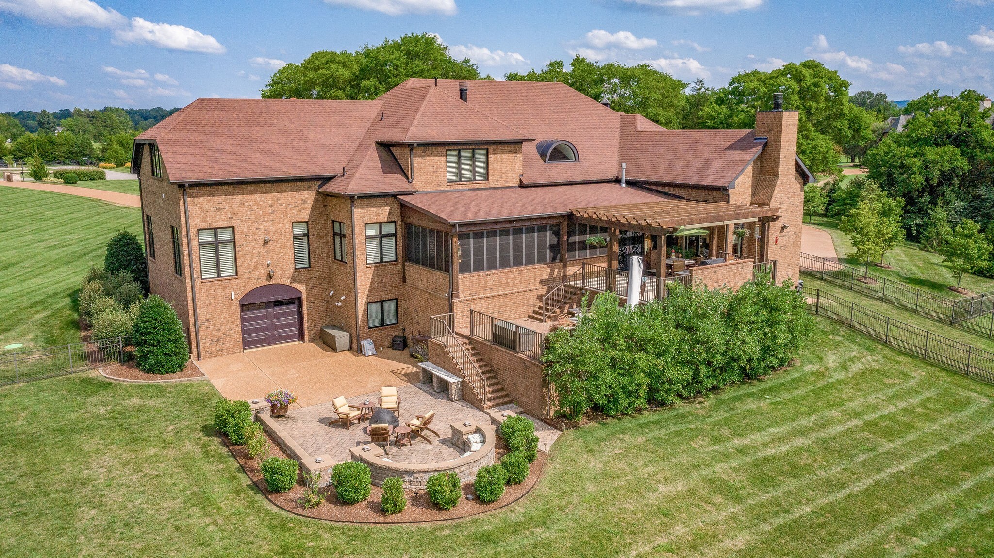 4411 Peytona Lane Franklin, TN 37064 - Photo 45 of 50 a aerial view of a house with table and chairs in patio