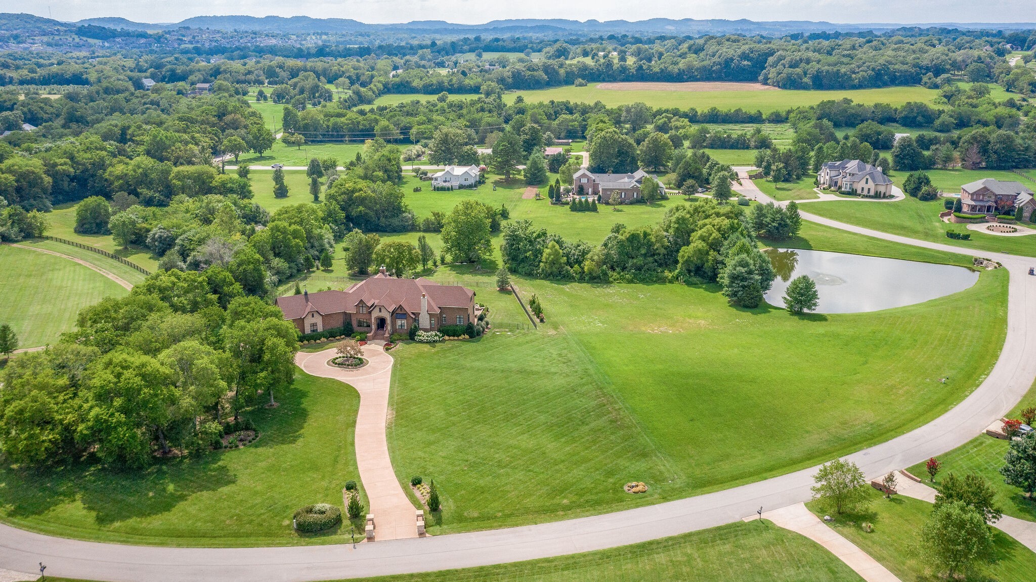 4411 Peytona Lane Franklin, TN 37064 - Photo 48 of 50 an aerial view of a house with outdoor space and a garden