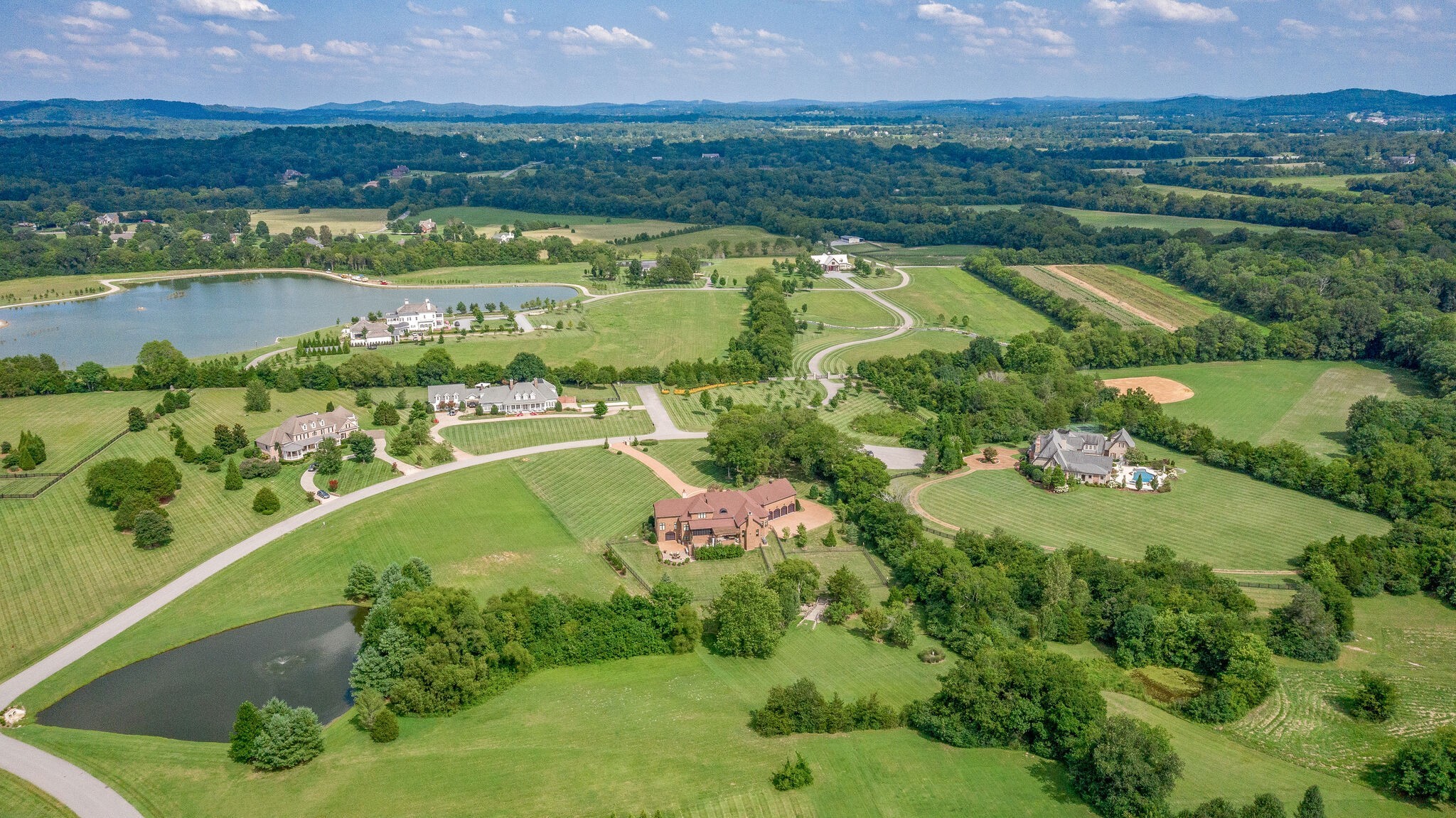 4411 Peytona Lane Franklin, TN 37064 - Photo 49 of 50 an aerial view of lake residential houses with outdoor space and swimming pool