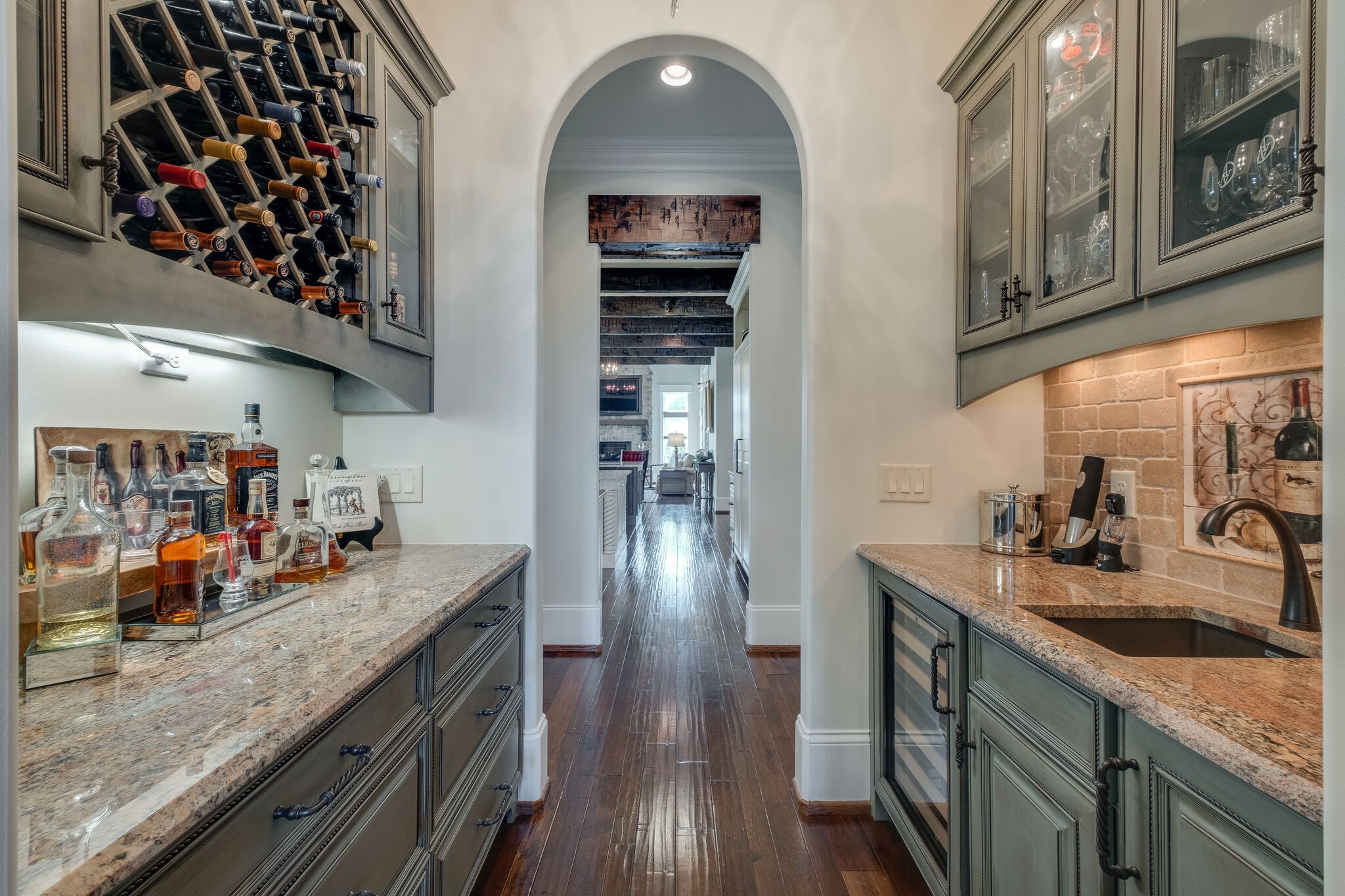 4411 Peytona Lane Franklin, TN 37064 - Photo 8 of 50 a kitchen with stainless steel appliances granite countertop a sink stove and cabinets