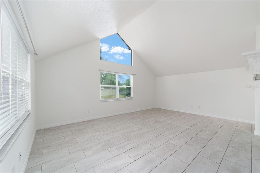 2159 Southeast 7th Terrace Ocala, FL 34471 - Photo 11 of 59 an empty room with windows