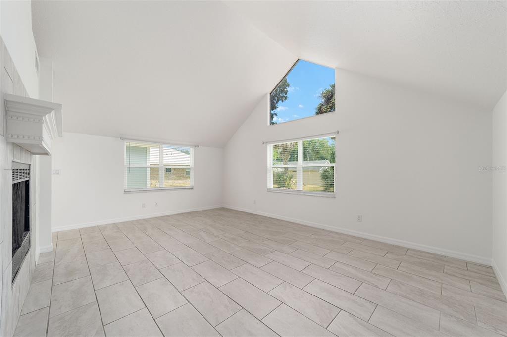 2159 Southeast 7th Terrace Ocala, FL 34471 - Photo 14 of 59 an empty room with windows