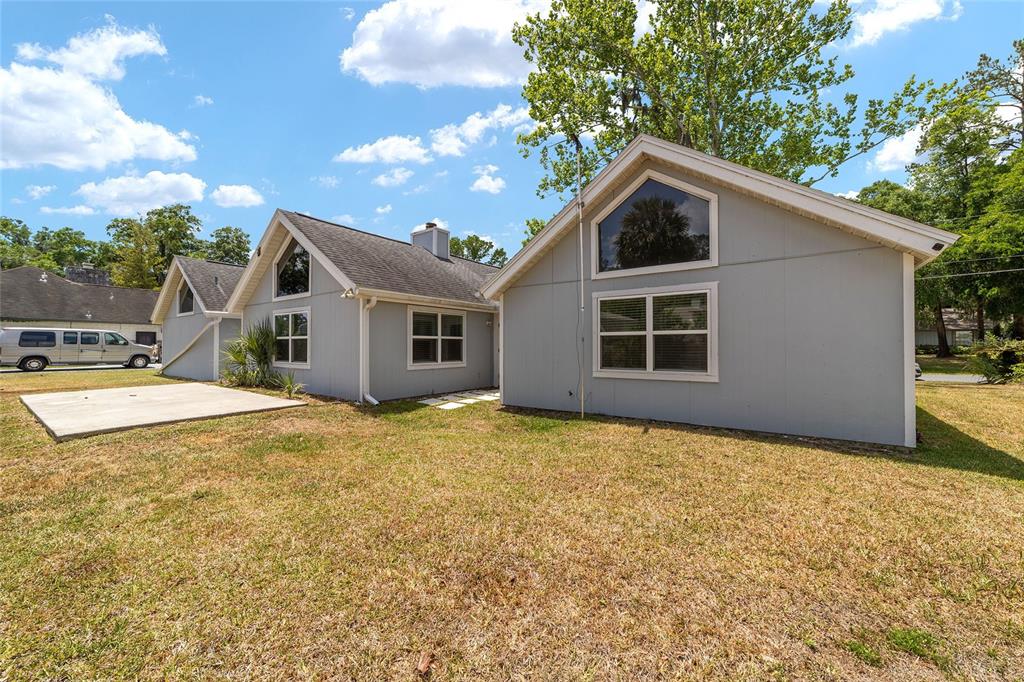 2159 Southeast 7th Terrace Ocala, FL 34471 - Photo 39 of 59 a view of a house with backyard and garden