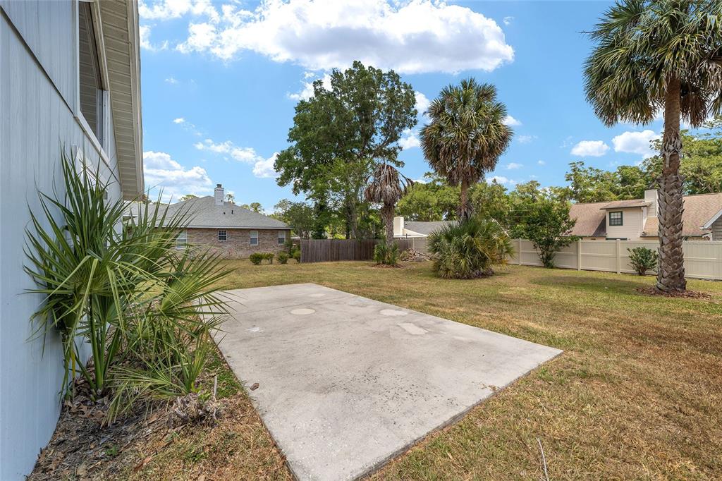 2159 Southeast 7th Terrace Ocala, FL 34471 - Photo 43 of 59 a view of a yard and basketball court