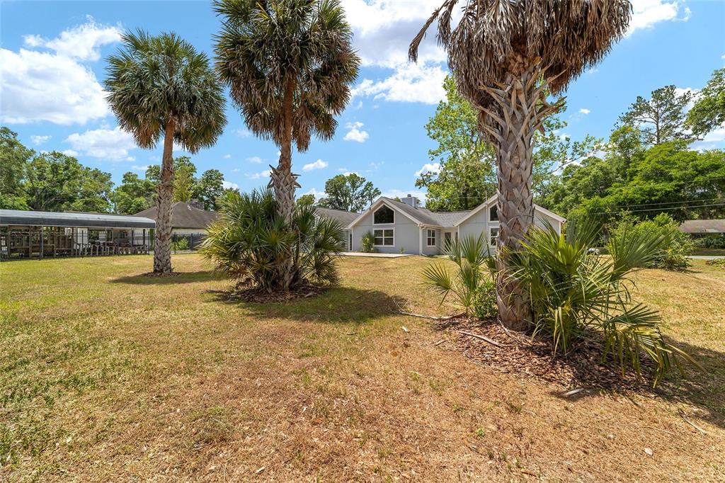 2159 Southeast 7th Terrace Ocala, FL 34471 - Photo 46 of 59 a view of a house with a yard