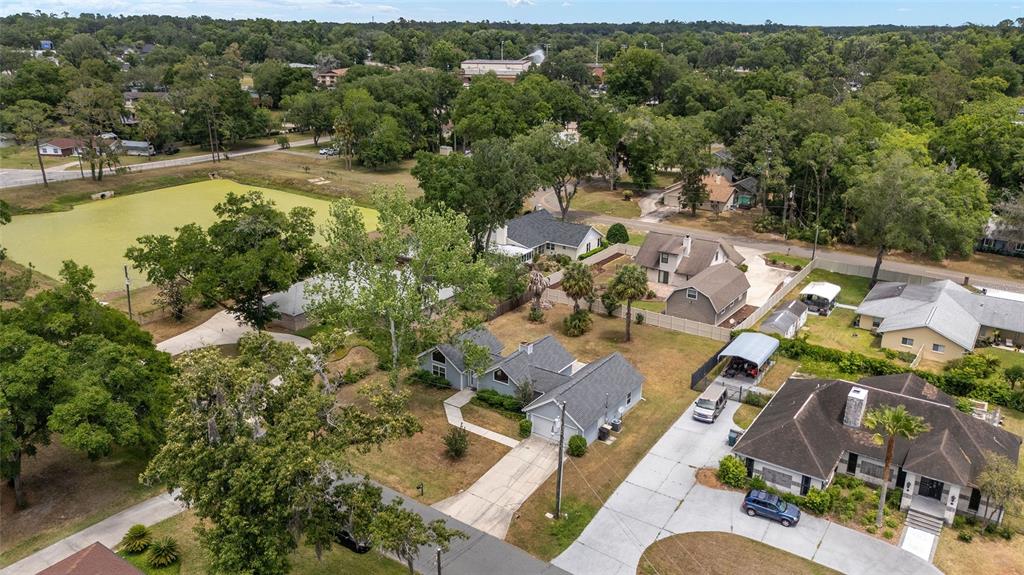 2159 Southeast 7th Terrace Ocala, FL 34471 - Photo 50 of 59 an aerial view of residential houses with outdoor space and trees