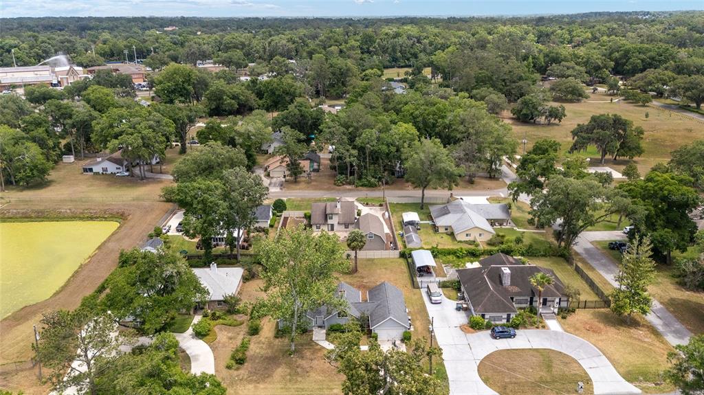 2159 Southeast 7th Terrace Ocala, FL 34471 - Photo 51 of 59 an aerial view of a houses with a yard