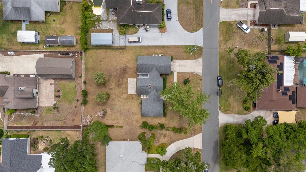 2159 Southeast 7th Terrace Ocala, FL 34471 - Photo 54 of 59 an aerial view of residential houses with outdoor space