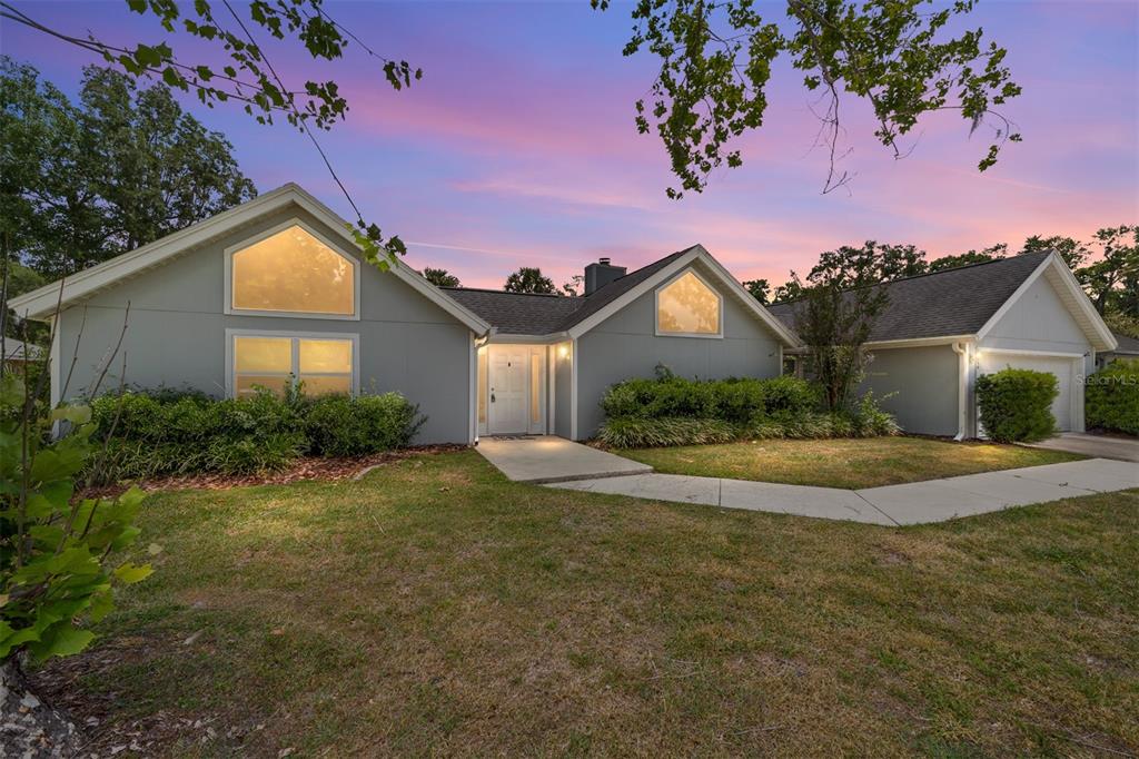2159 Southeast 7th Terrace Ocala, FL 34471 - Photo 7 of 59 a view of house with backyard and garden