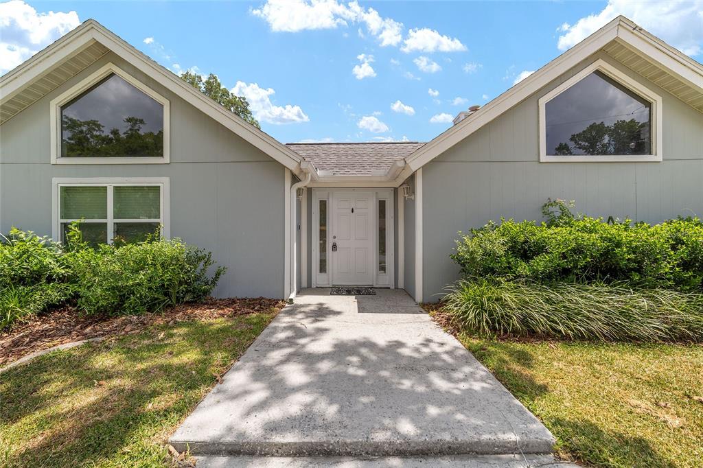 2159 Southeast 7th Terrace Ocala, FL 34471 - Photo 8 of 59 a front view of house with yard