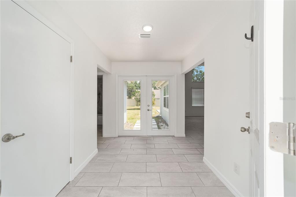 2159 Southeast 7th Terrace Ocala, FL 34471 - Photo 9 of 59 a view of an empty room with a window