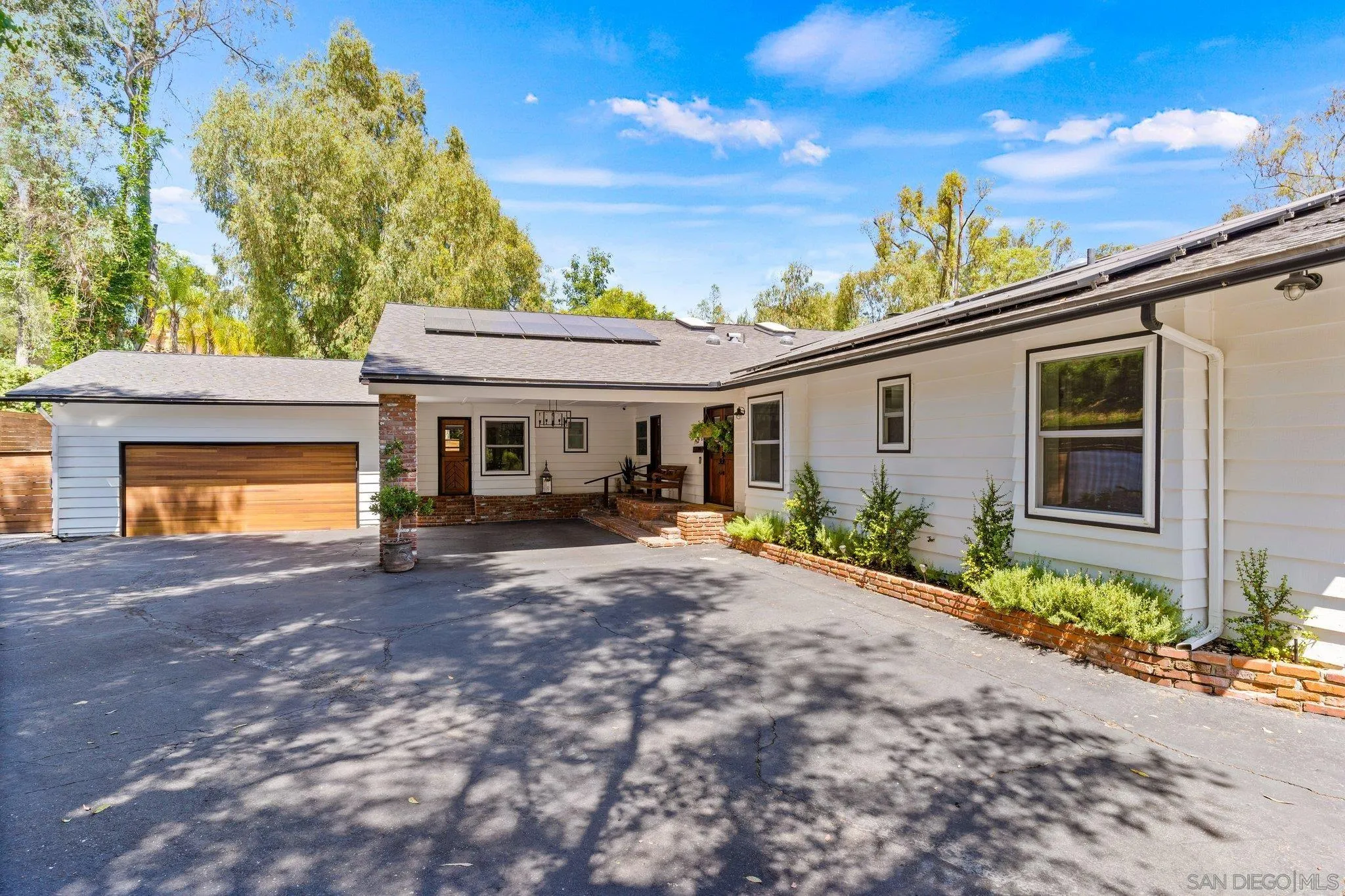 13229 Stone Canyon Road Poway, CA 92064 - Photo 1 of 29 a view of a house with backyard and porch