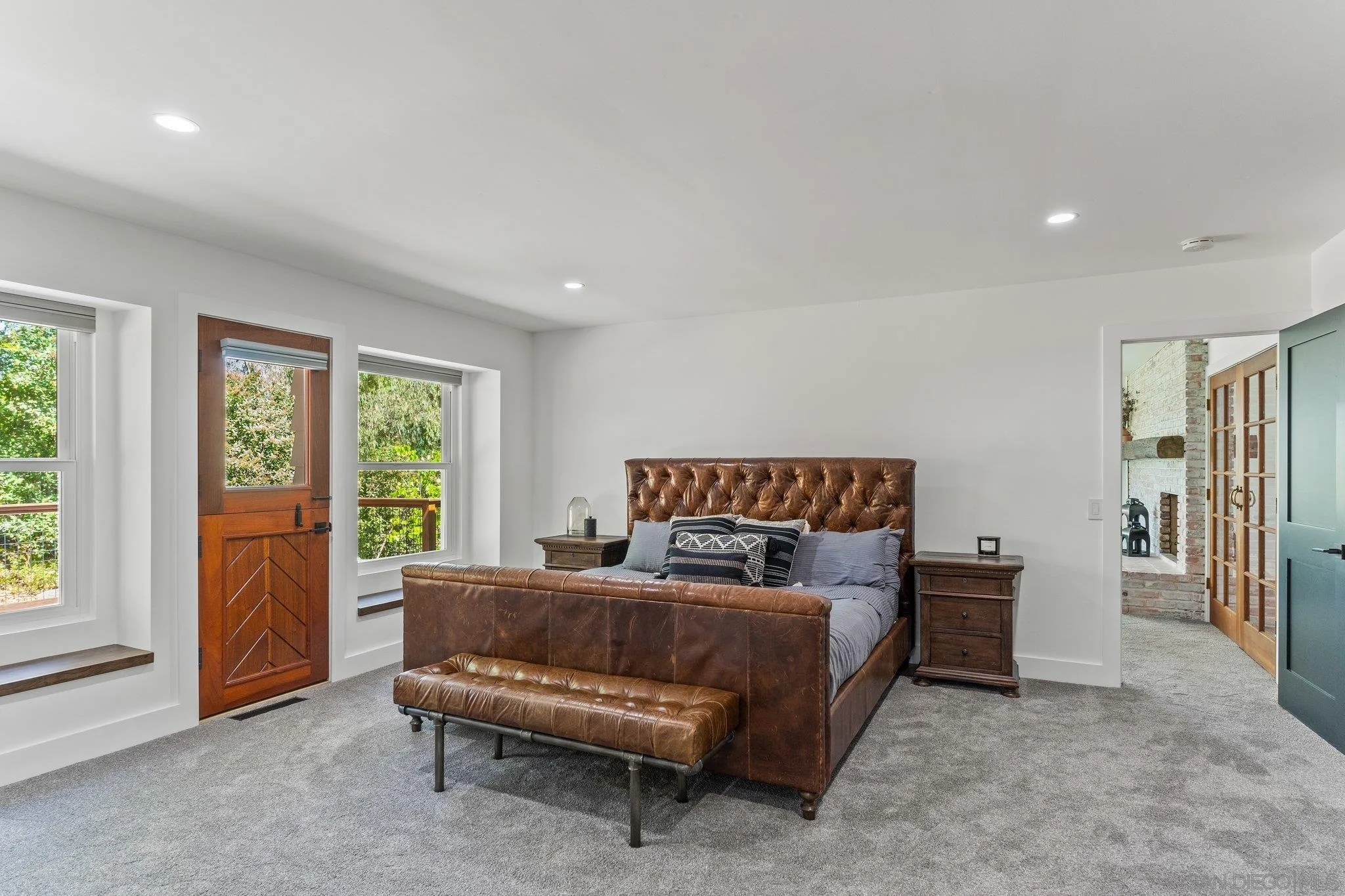 13229 Stone Canyon Road Poway, CA 92064 - Photo 13 of 29 a bedroom with a bed and a large window