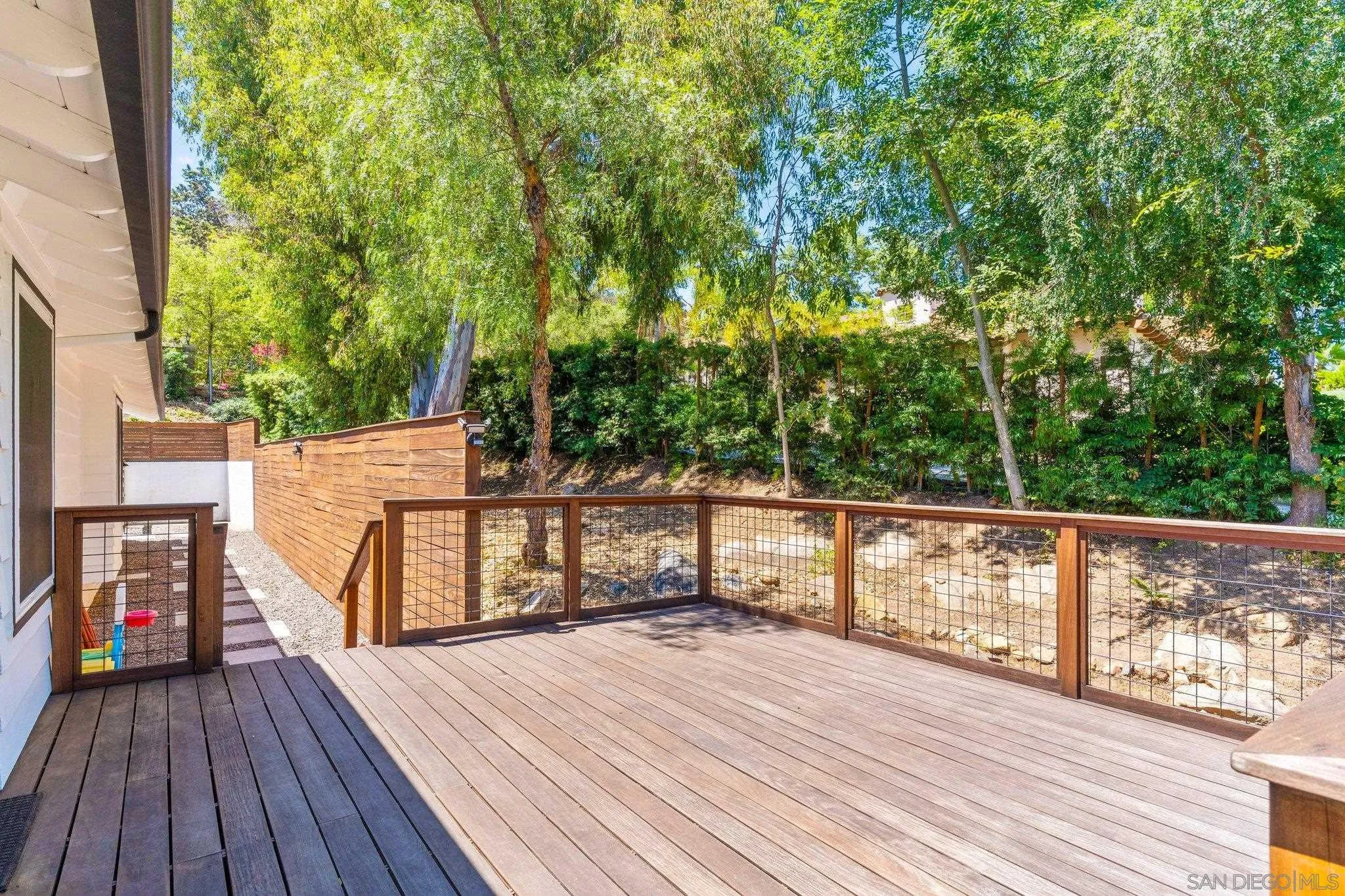 13229 Stone Canyon Road Poway, CA 92064 - Photo 15 of 29 a view of deck with chairs and wooden floor