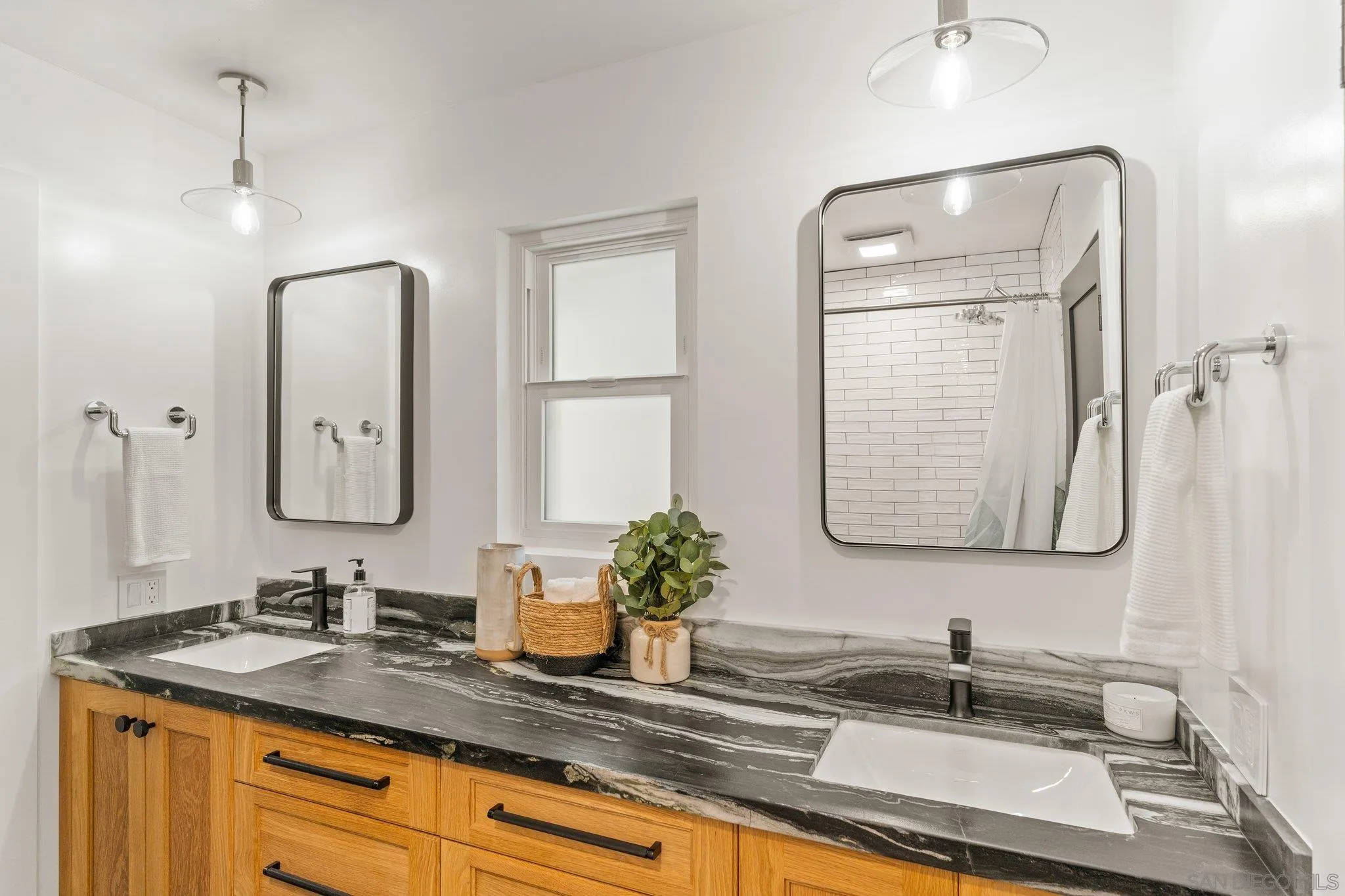 13229 Stone Canyon Road Poway, CA 92064 - Photo 20 of 29 a bathroom with a sink and a mirror