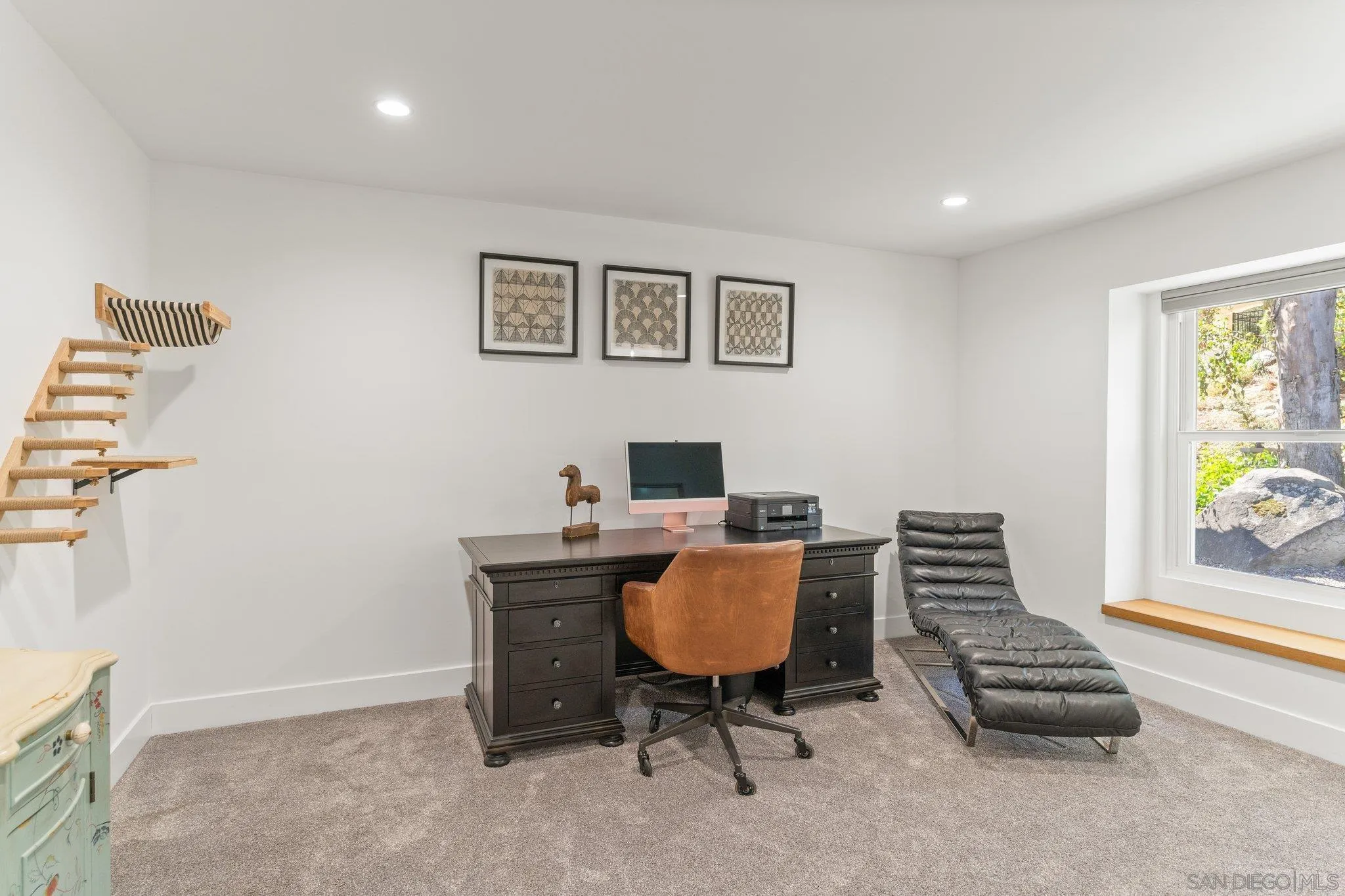 13229 Stone Canyon Road Poway, CA 92064 - Photo 21 of 29 a workspace with furniture and painting on the wall
