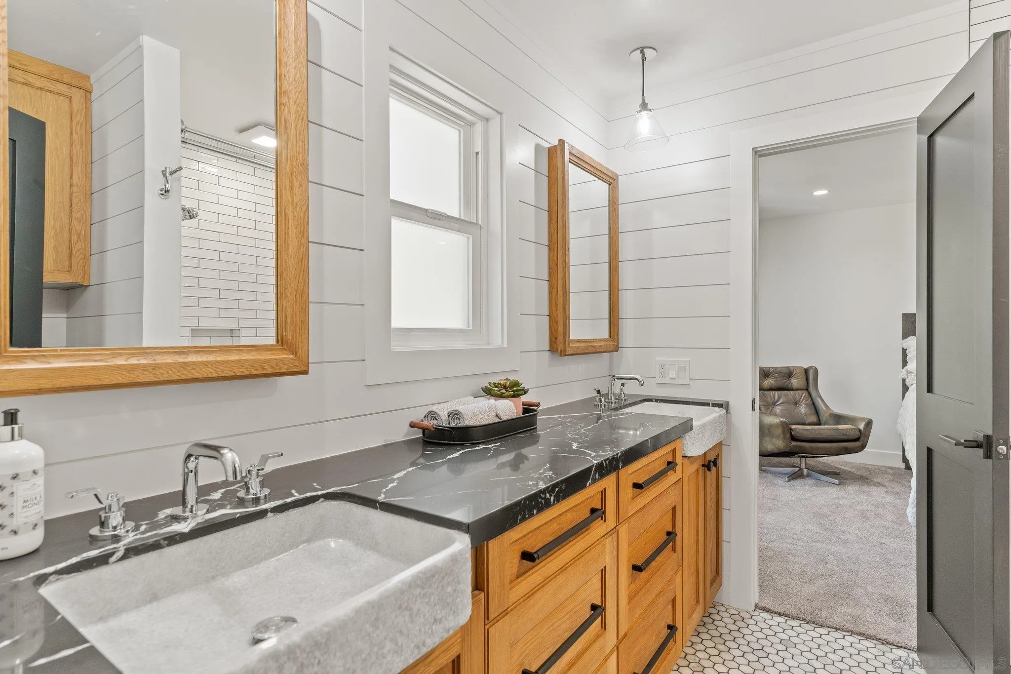13229 Stone Canyon Road Poway, CA 92064 - Photo 23 of 29 a bathroom with a granite countertop sink and a window
