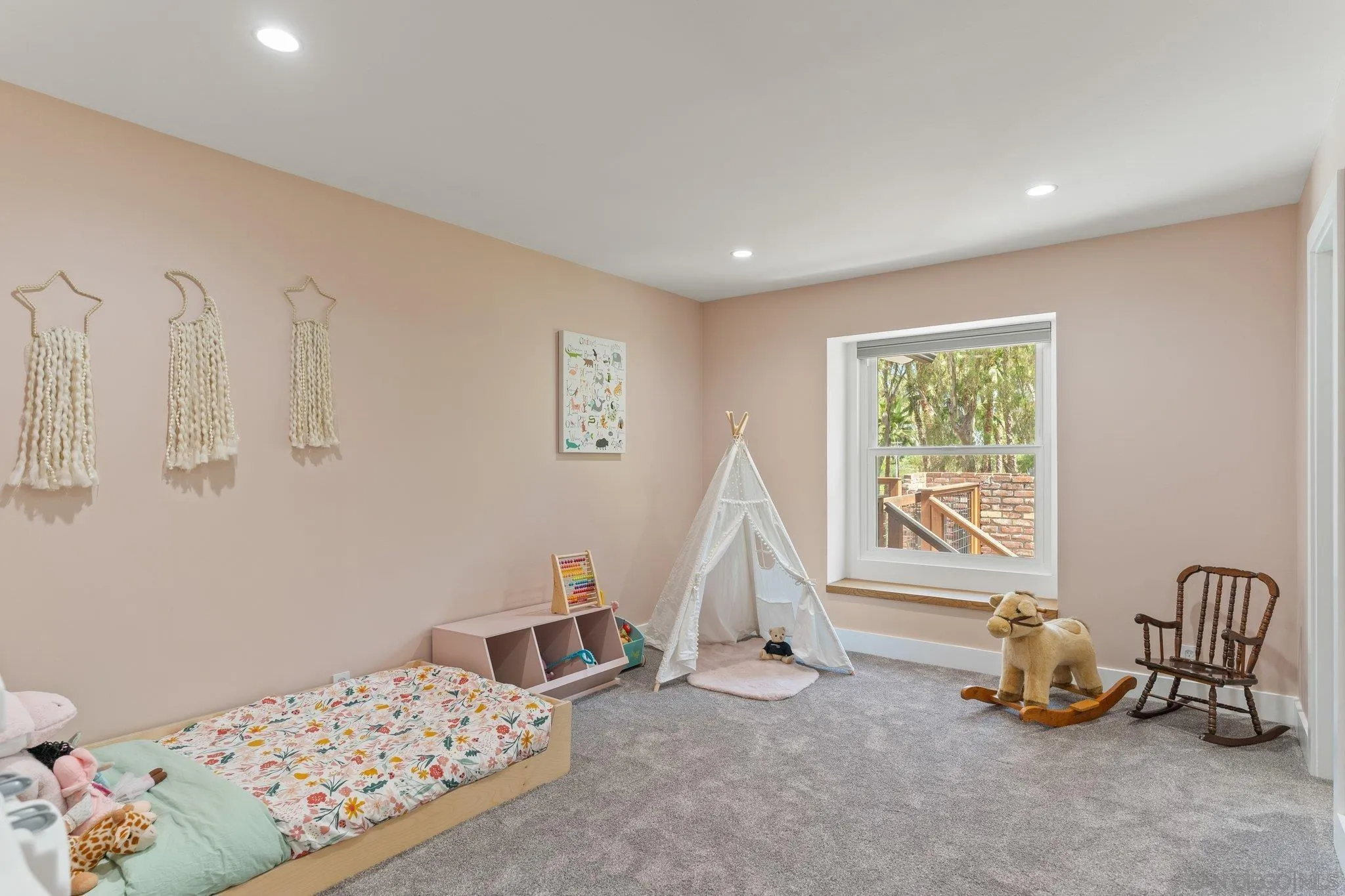 13229 Stone Canyon Road Poway, CA 92064 - Photo 24 of 29 a bedroom with furniture and a window