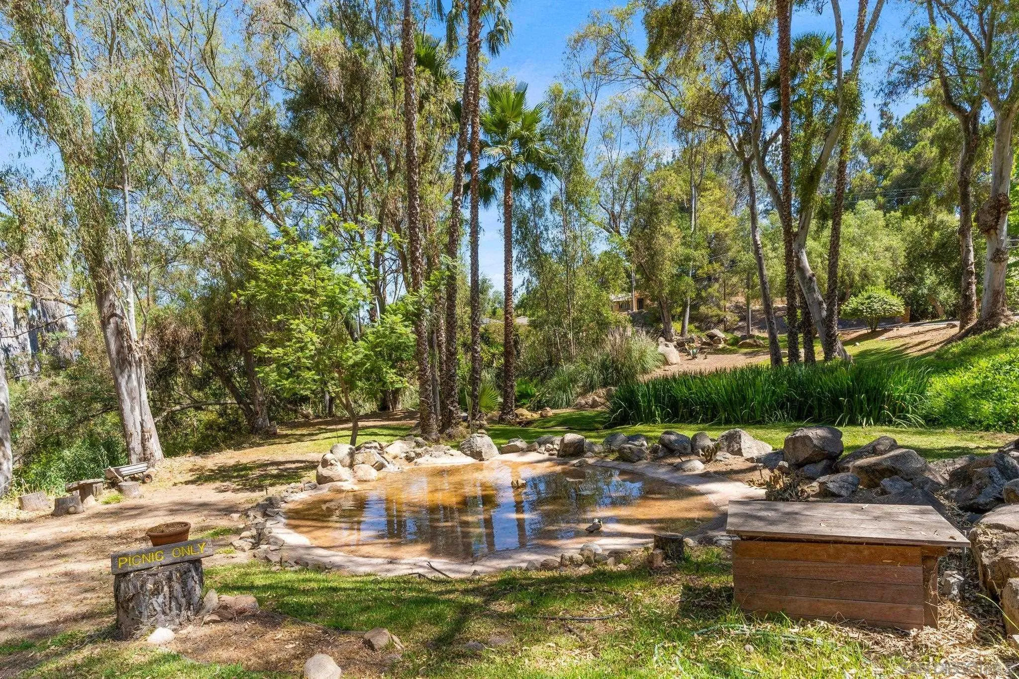 13229 Stone Canyon Road Poway, CA 92064 - Photo 26 of 29 a view of swimming pool with a yard