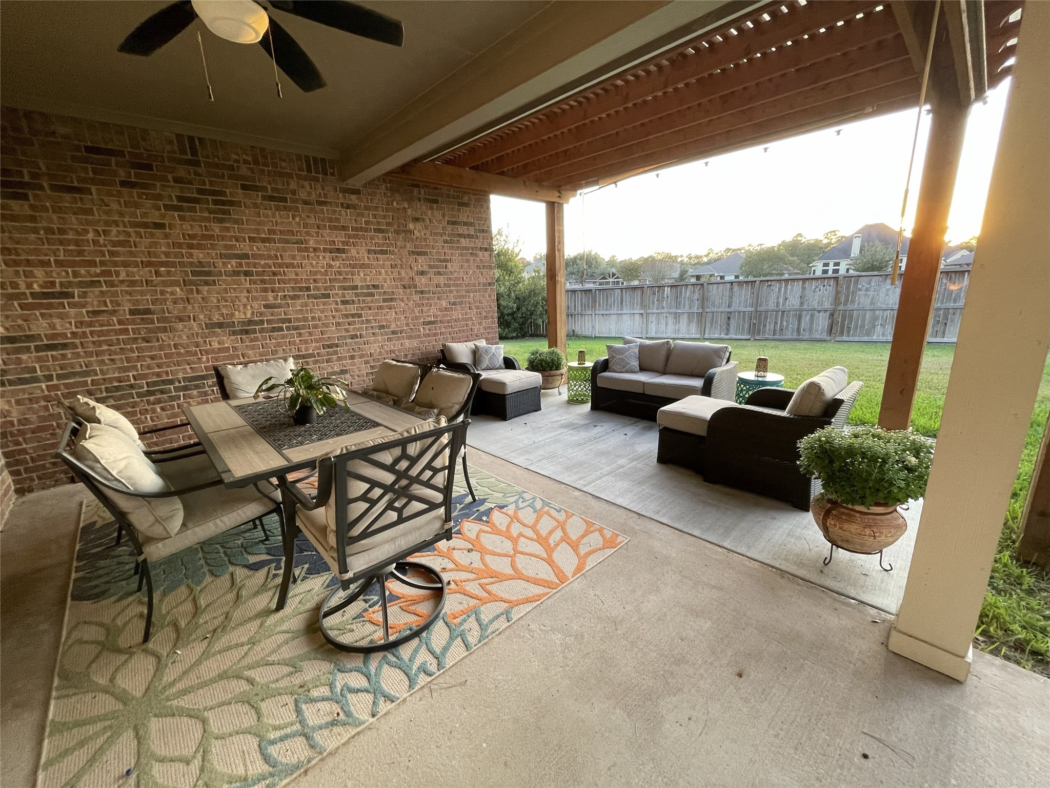 1631 Andrew Chase Lane Spring, TX 77386 - Photo 16 of 16 a living room with patio furniture and a floor to ceiling window