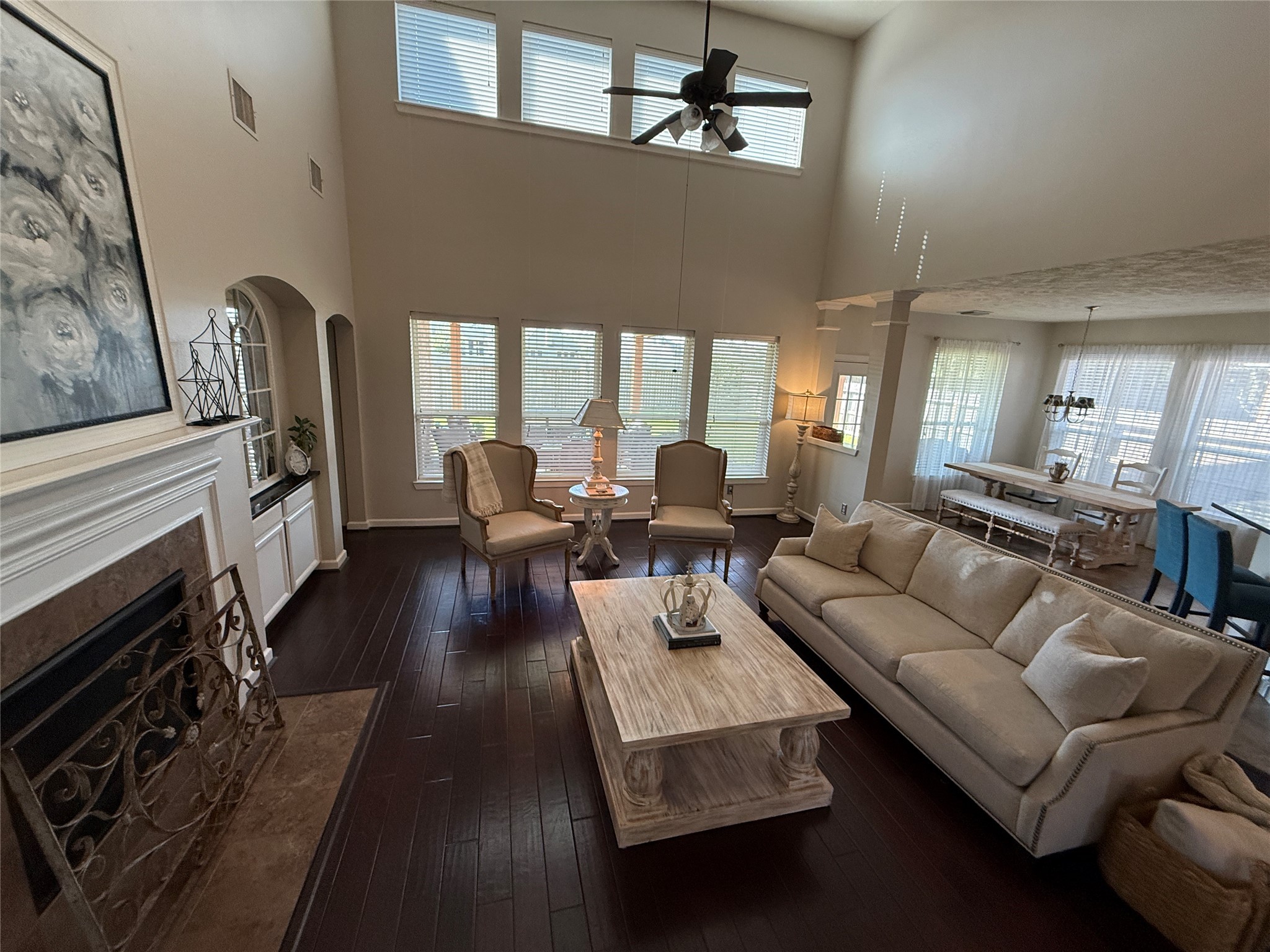 1631 Andrew Chase Lane Spring, TX 77386 - Photo 3 of 16 a living room with furniture hard wood floor and a fireplace