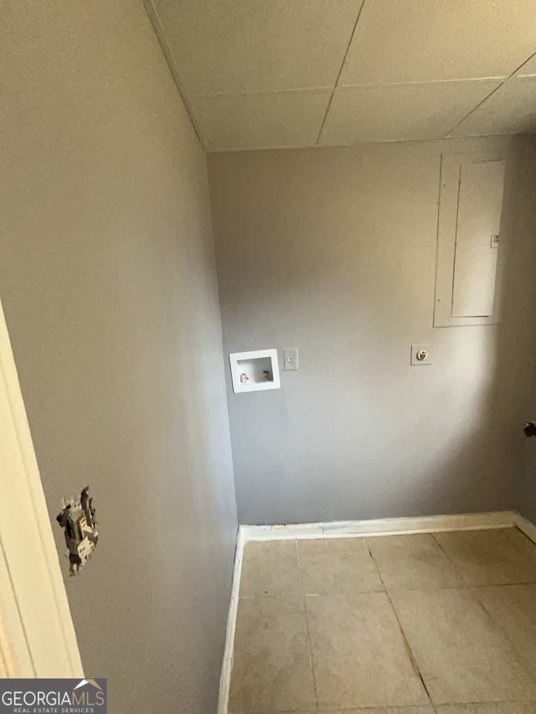 1682 Charmeth Road Lithonia, GA 30058 - Photo 38 of 52 a view of room with hardwood floor