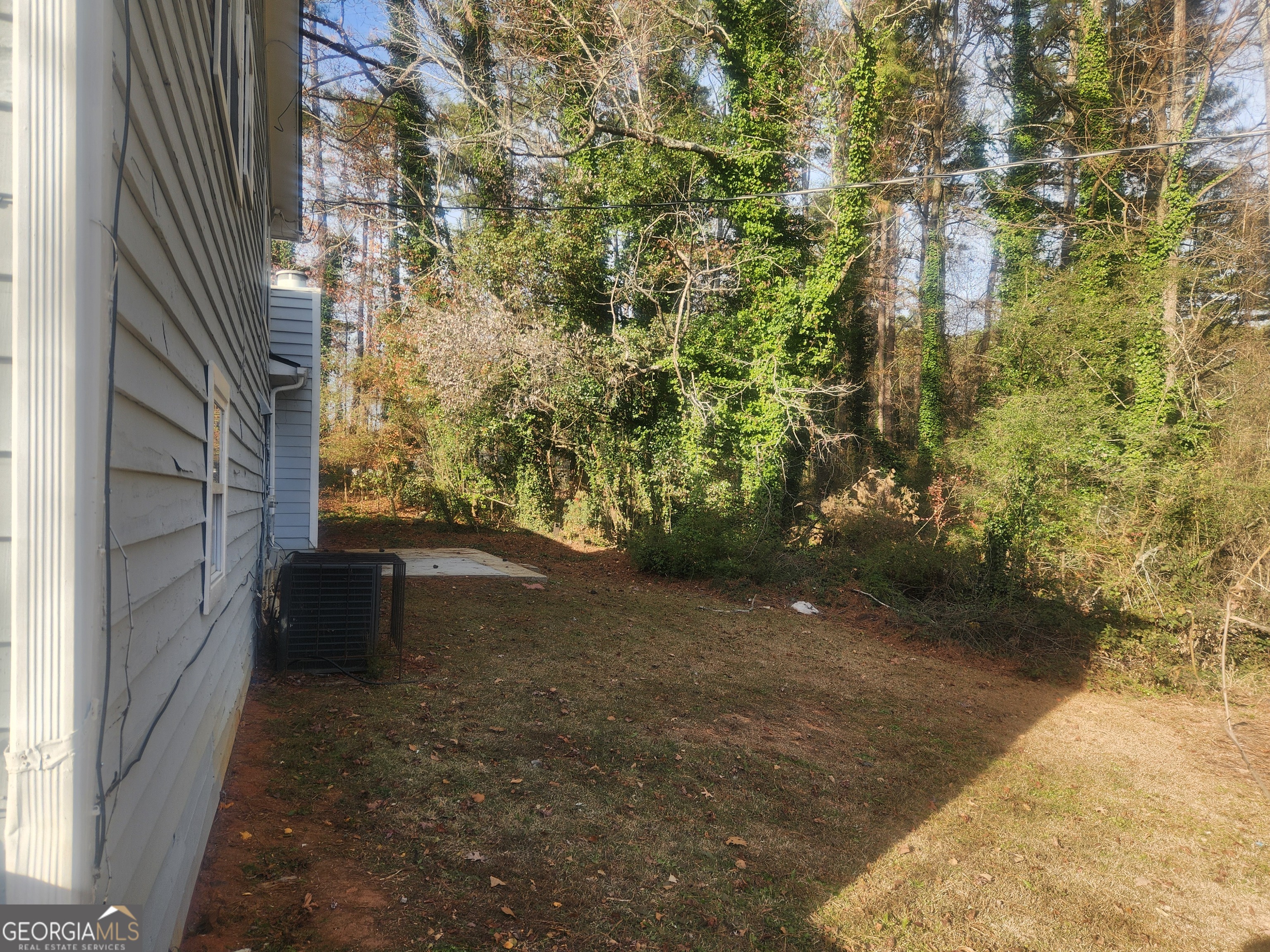 1682 Charmeth Road Lithonia, GA 30058 - Photo 48 of 52 a view of a garden